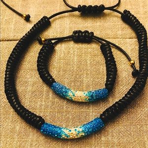 Matching teal and clear rhinestone encrusted tube bead necklace and bracelet